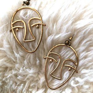 3/$12 Gold-tone hollow face earrings